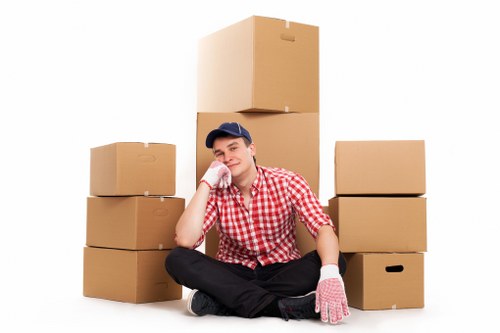 Packed boxes and furniture ready for student relocation in Hounslow