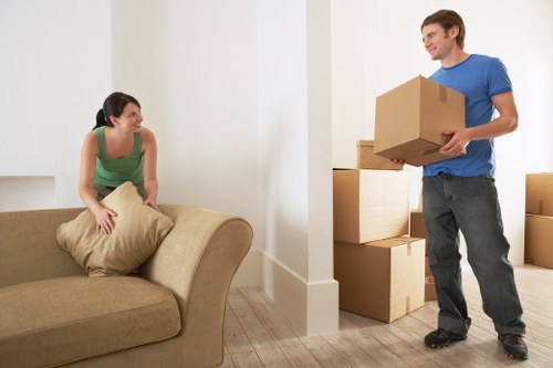 Furniture removal team collecting bulky items in a Hounslow street
